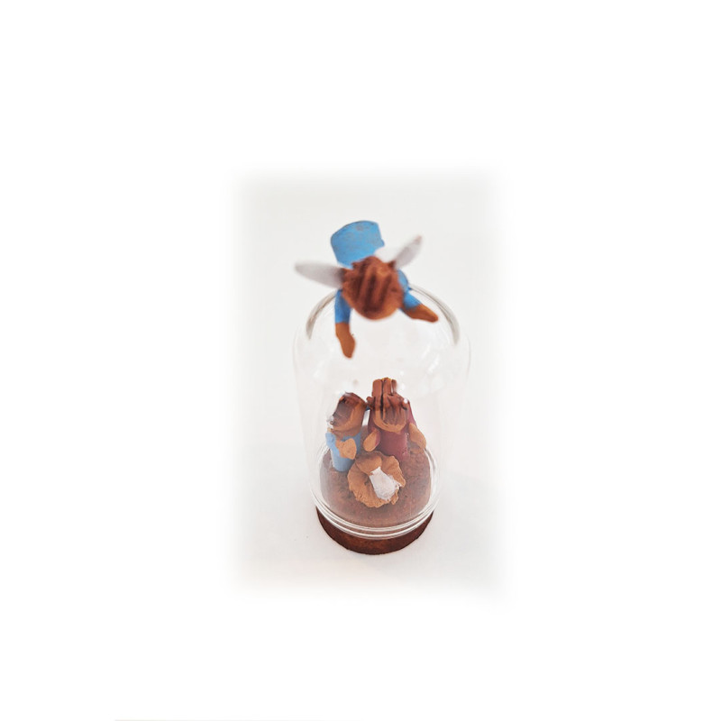 Nativity scene inside a cloche glass dome-miniature