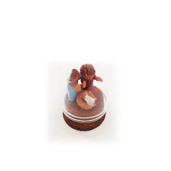 Nativity scene inside a cloche glass dome-miniature